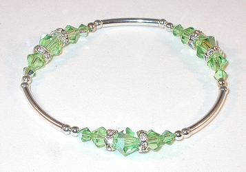 peridot green peridot bracelet peridot crystal rondelle swarovski austrian crystals sterling silver stretch-on bracelet